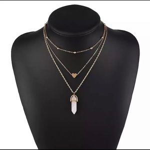 Gold tone layered heart rose quartz stone necklace